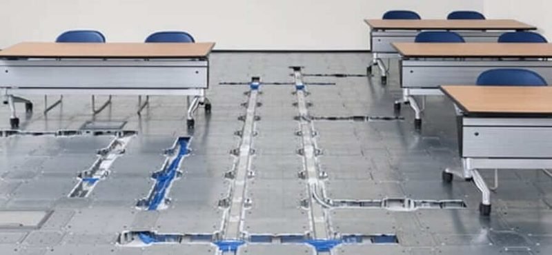 Ethernet network cabling running under an office floor to desks