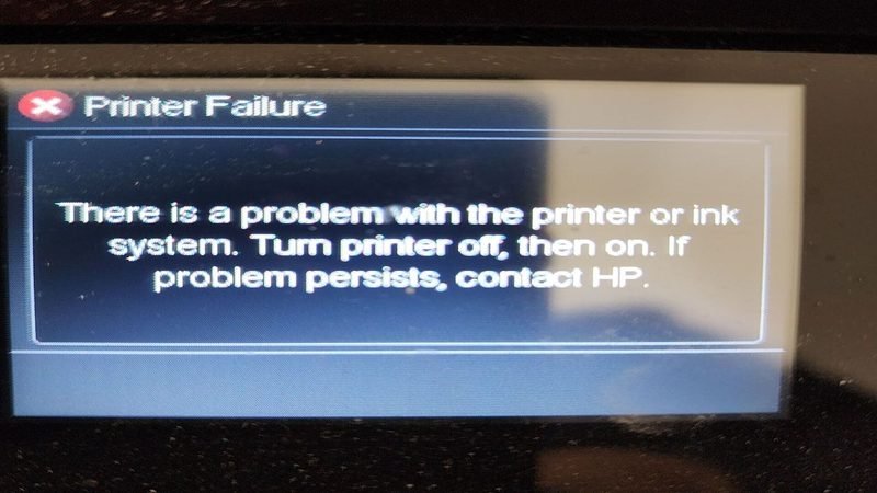 Printer display showing a printer failure error message