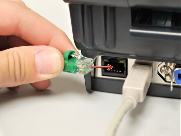 Plugging an Ethernet cable into a printer network port for wired setup
